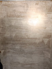 Plain sand-greige rug with a soft sheen and faint tonal marks, carpet 134813