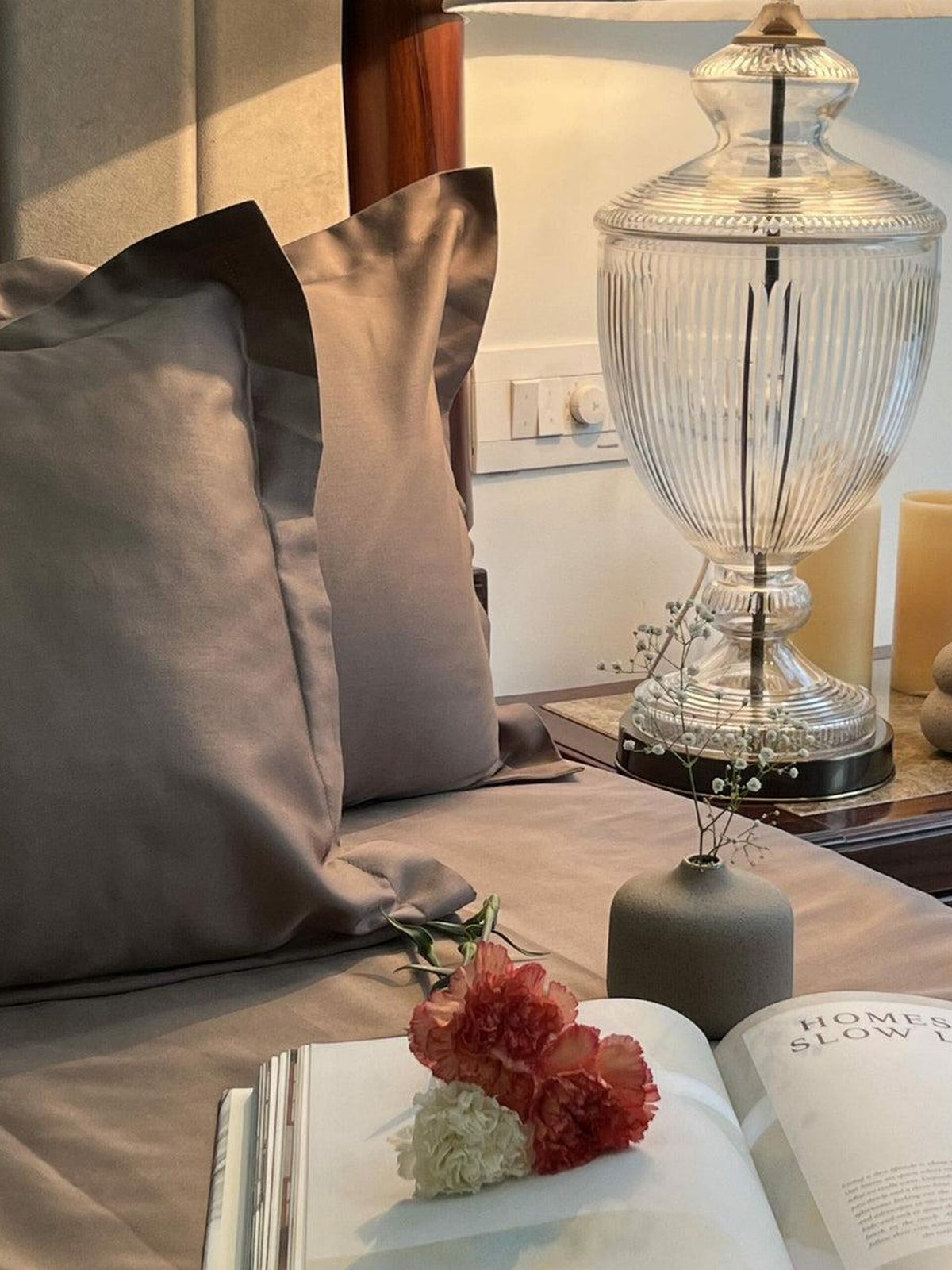 Taupe sateen pillows beside a crystal lamp, Taupe Luxe Collection