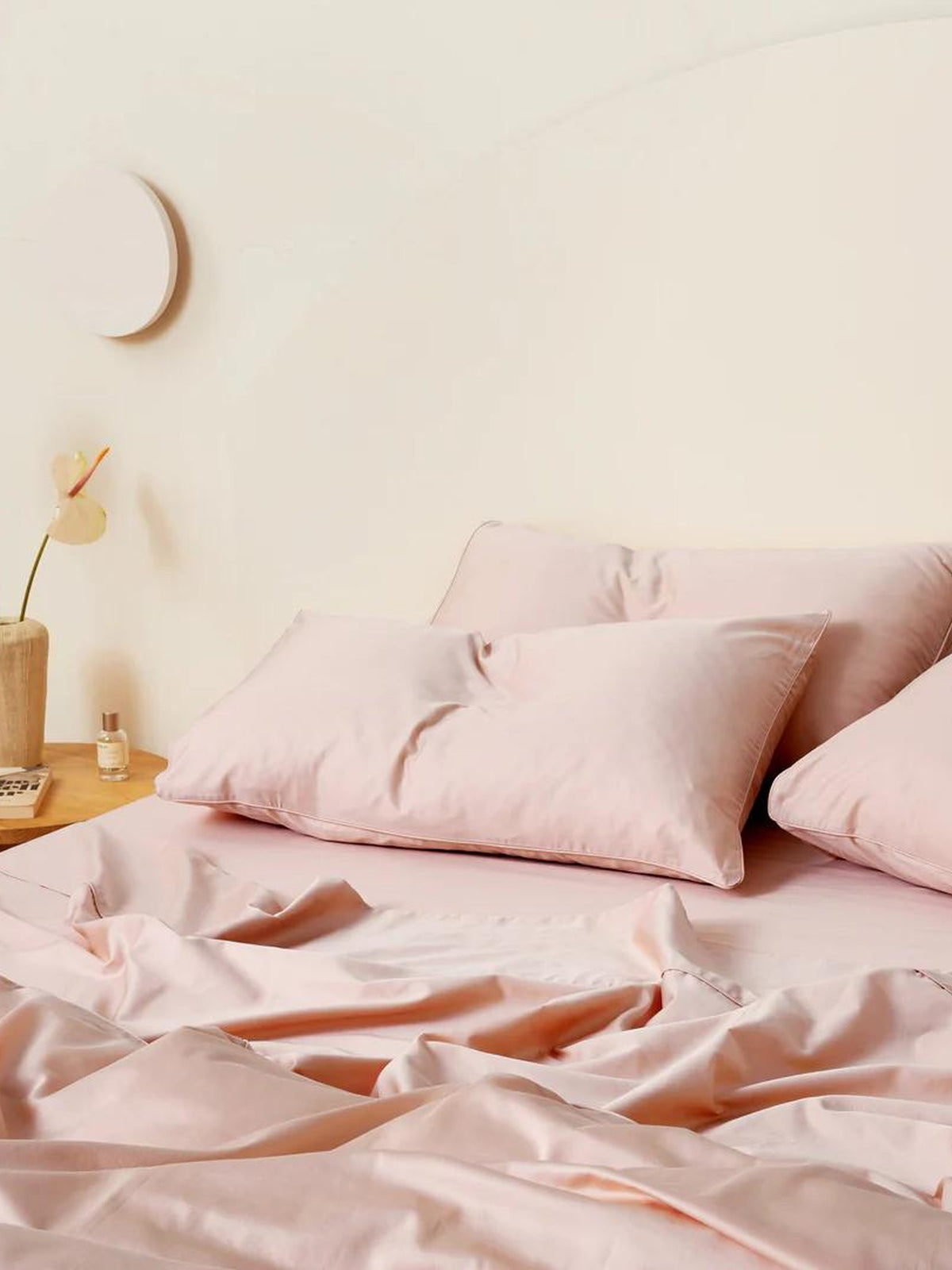 Blush pink bedding made up in a bright room, Blush Luxe Collection