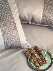Silver grey bedding with a diamond-lattice embroidered panel, Silver Arcane Collection