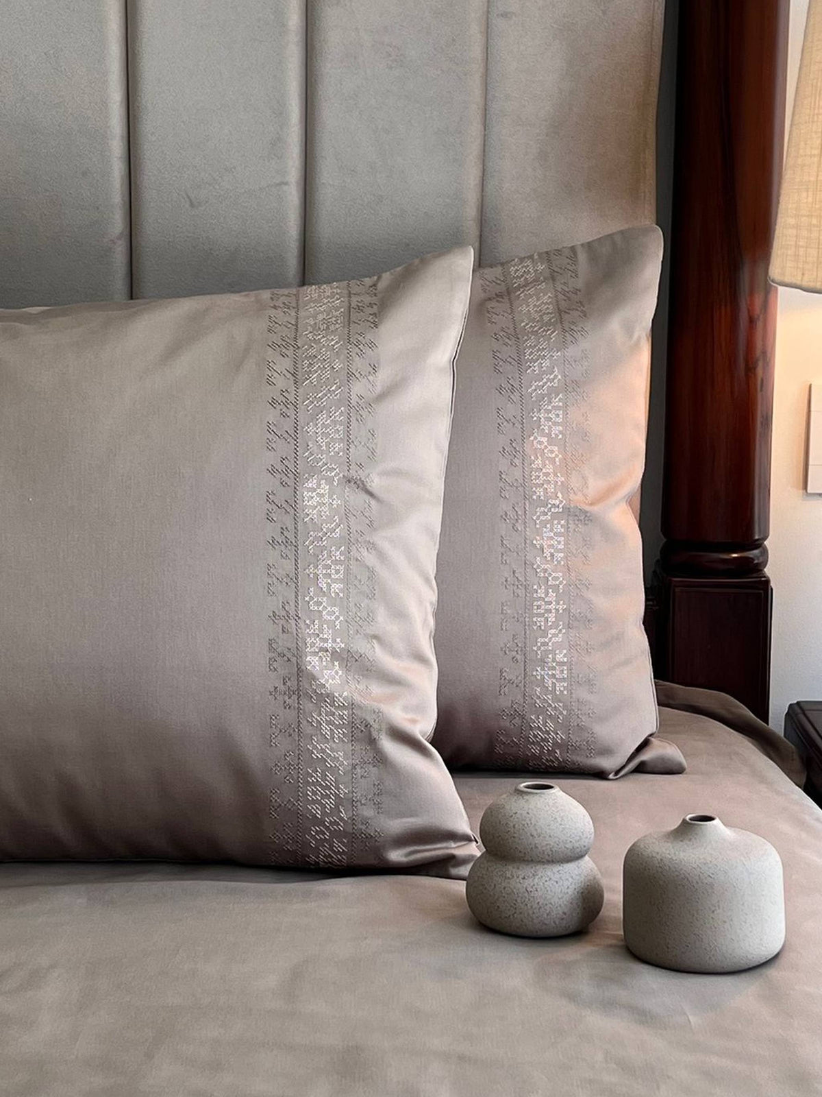 Greige bedding with a fine tonal embroidered band on the pillows, Greige Delight