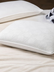 Two white latex pillows on a bed, mmFoam Passion Pillow