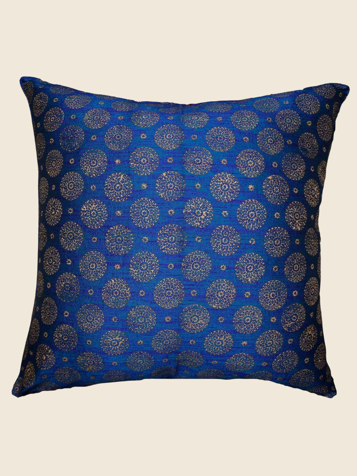 Royal blue cushion cover with an allover gold medallion brocade pattern