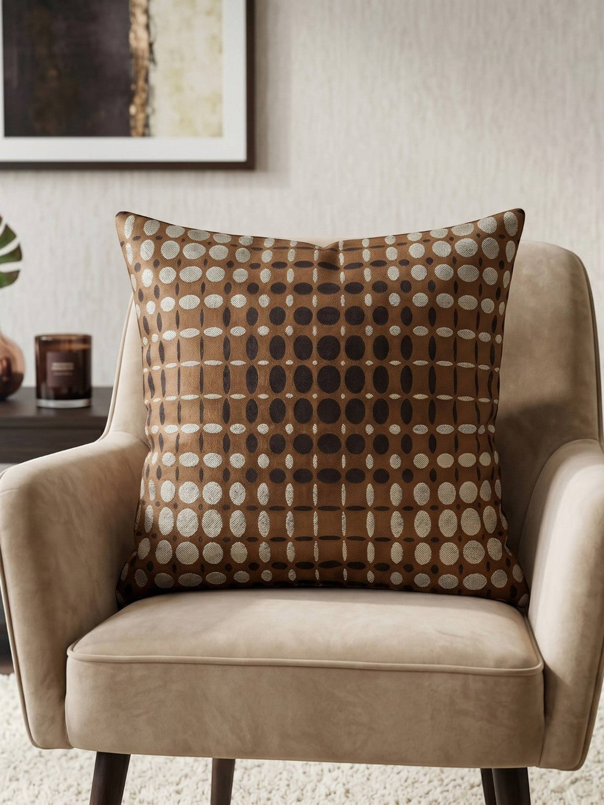 Brown geometric printed cushion cover featuring an abstract circular pattern in brown and beige tones