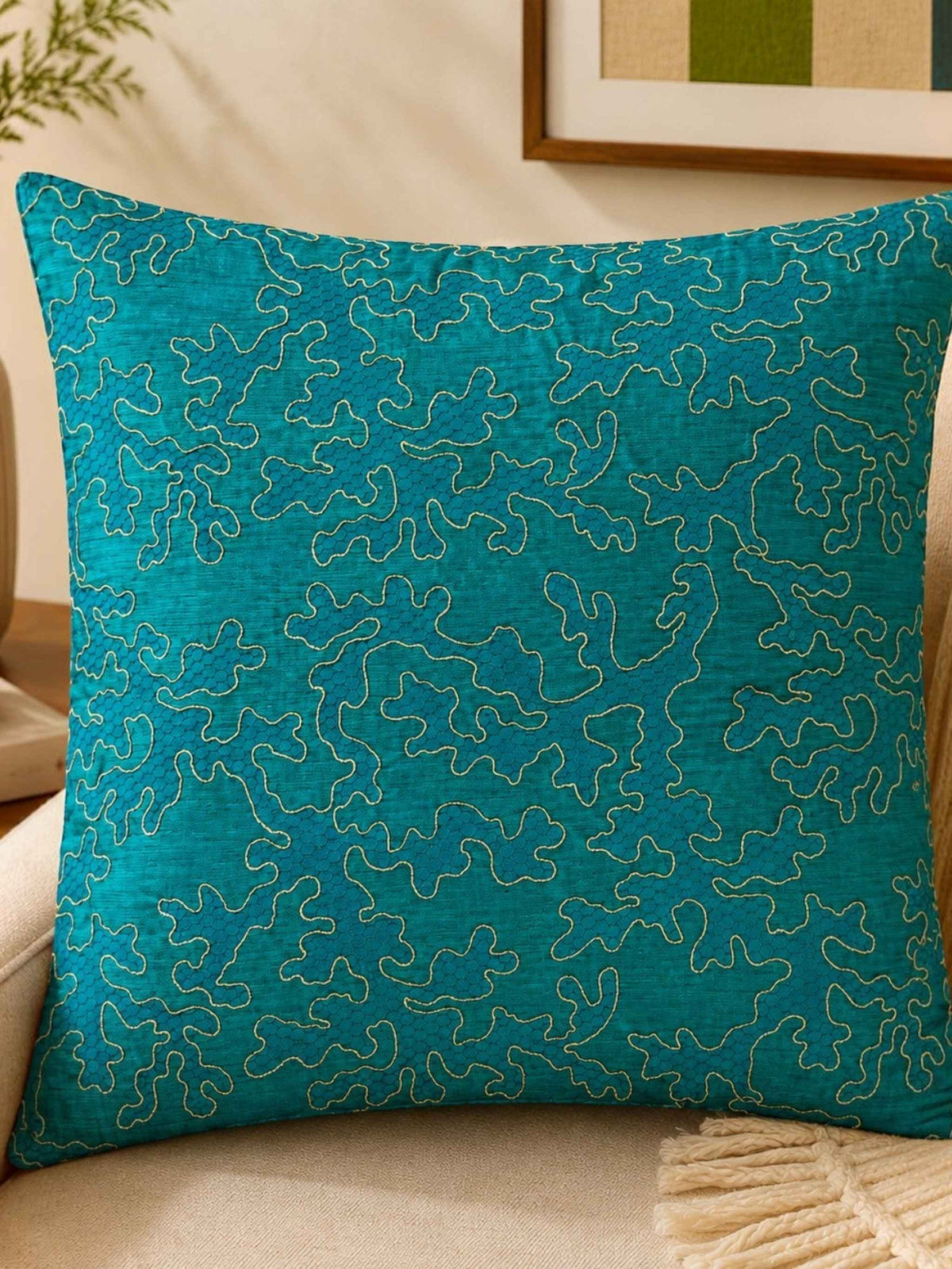 Teal blue patch work polysilk cushion cover with decorative stitched pattern