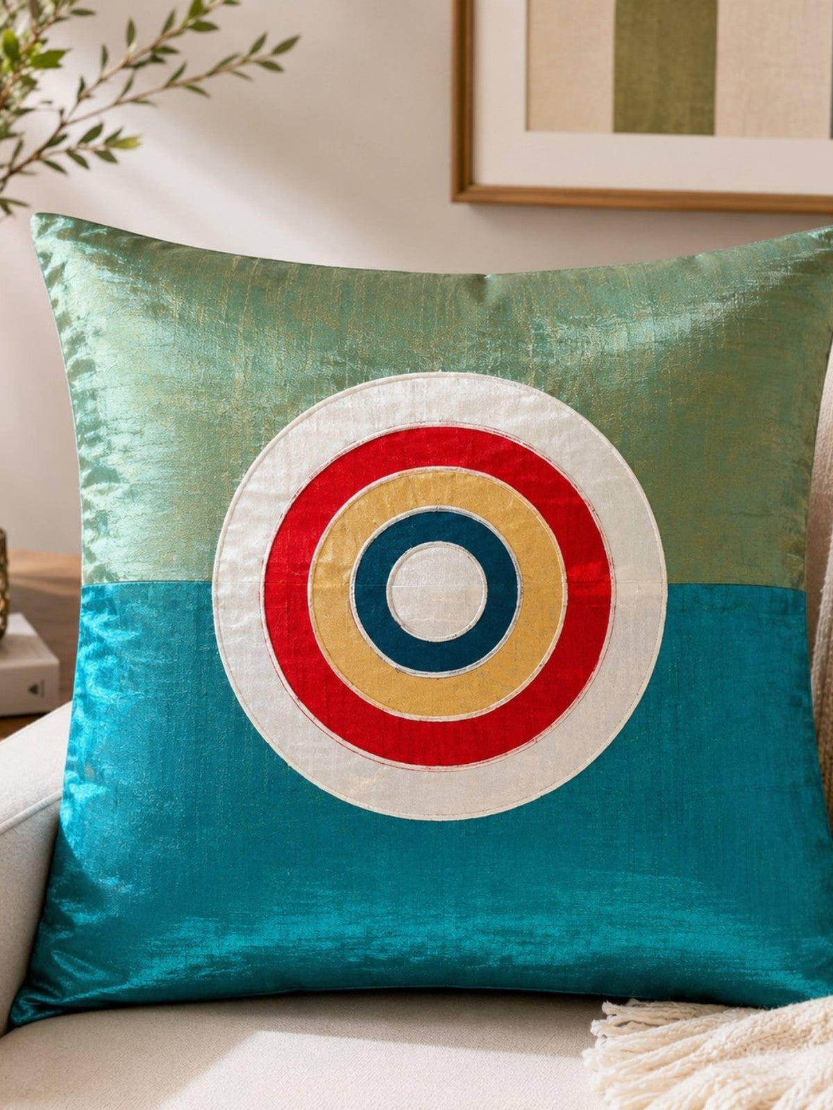Blue patch work polysilk cushion cover with circular applique design