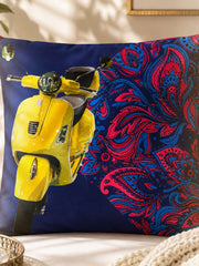 Jagdish Store reversible throw cushion cover with yellow scooter and pink and blue paisley print on navy fabric.