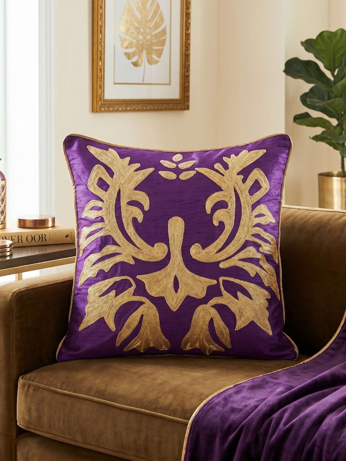Jagdish Store purple cushion cover with intricate gold sequin floral embroidery and a luxurious textured finish.