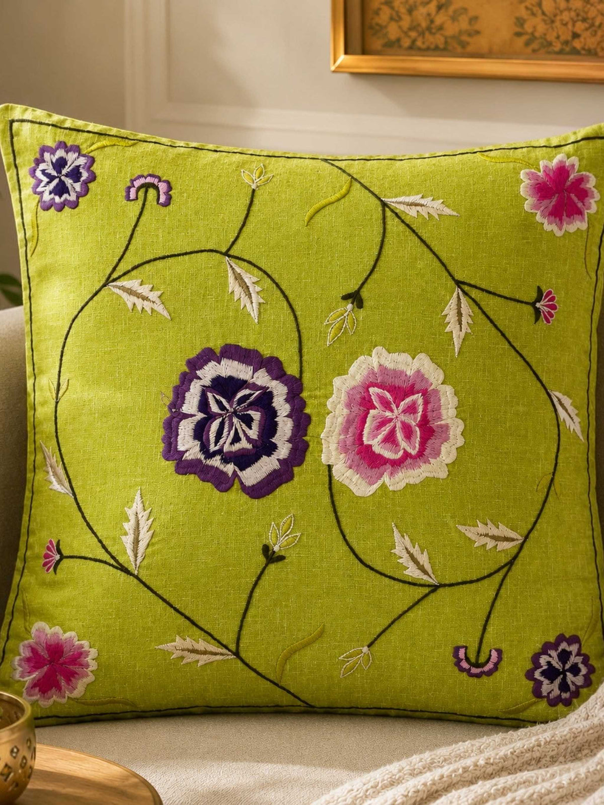 Green cotton cushion cover with floral embroidery and vine design