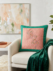 Jagdish Store pink quilted cushion cover with embroidered silver thread, colorful beads, and emerald green border.