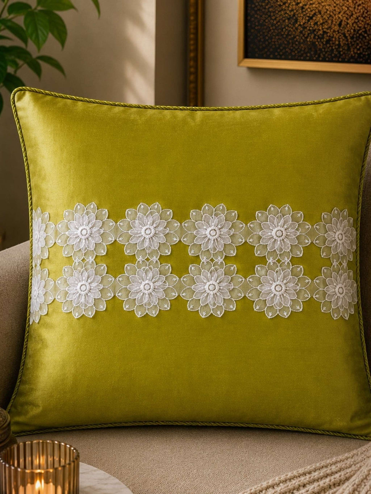 Jagdish Store decorative cushion cover in lime green satin with white floral lace trim. Elegant floral accents.