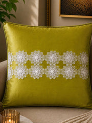 Jagdish Store decorative cushion cover in lime green satin with white floral lace trim. Elegant floral accents.