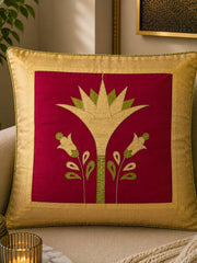 Jagdish Store decorative cushion cover with crimson red fabric, gold lotus embroidery, and gold trim. Features green accents.