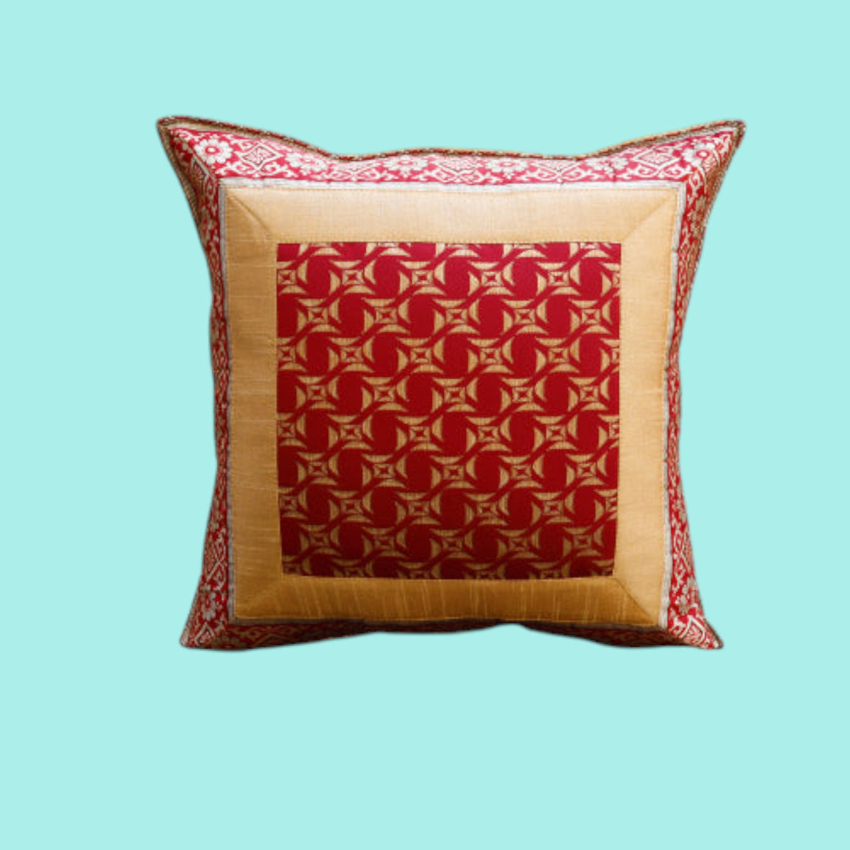 Maroon and gold geometric medallion art silk cushion cover with a gold silk border