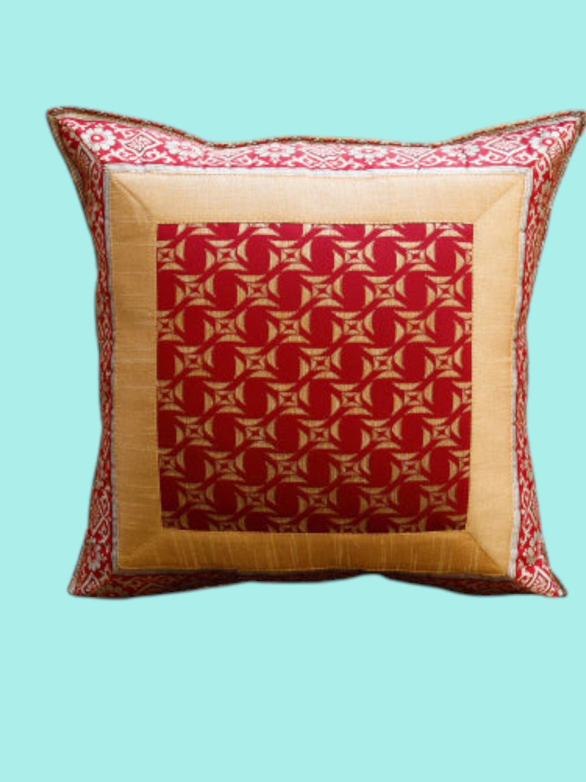 Maroon and gold geometric medallion art silk cushion cover with a gold silk border