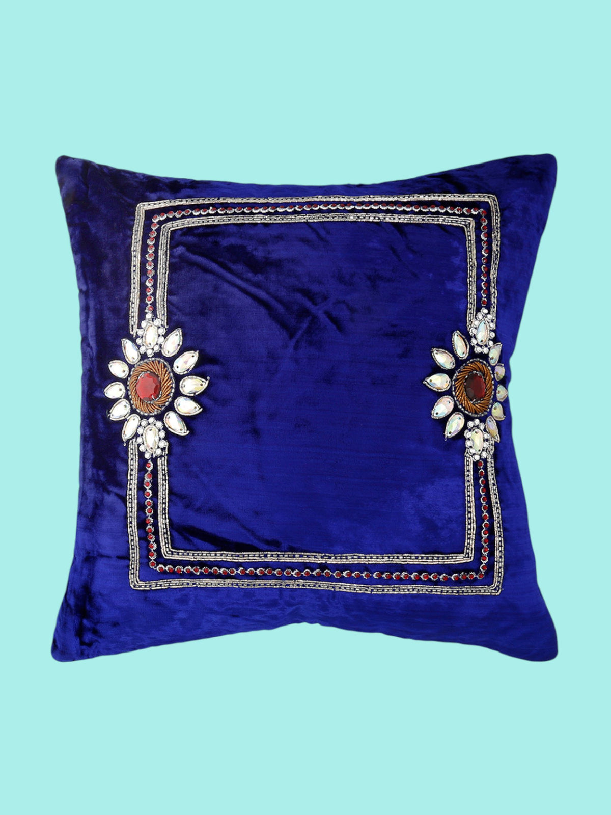 Royal blue velvet cushion cover with a silver zari embroidered border and floral medallions
