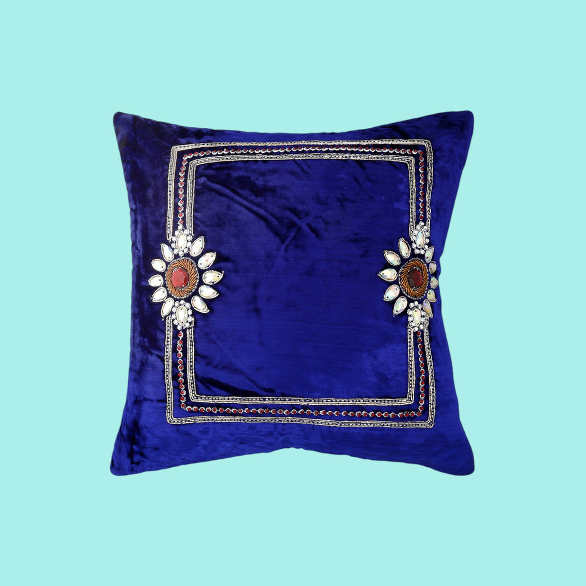 Royal blue velvet cushion cover with a silver zari embroidered border and floral medallions
