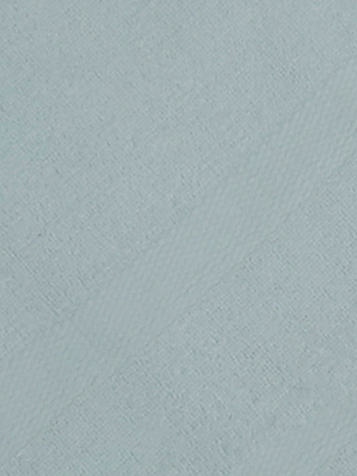 Close-up of mint-blue bamboo bath towel fabric texture