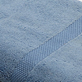 Light blue cotton bath towel folded texture view