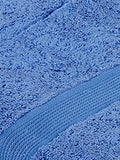 Blue cotton bath towel folded texture view