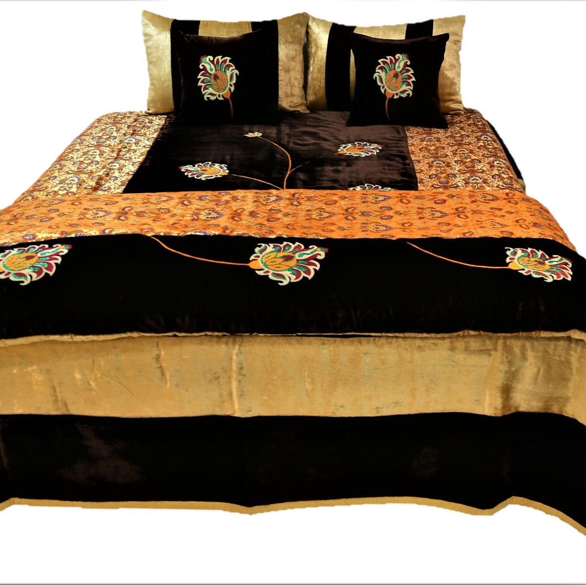 Black and gold flower embroidered velvet wedding set made up on a double bed