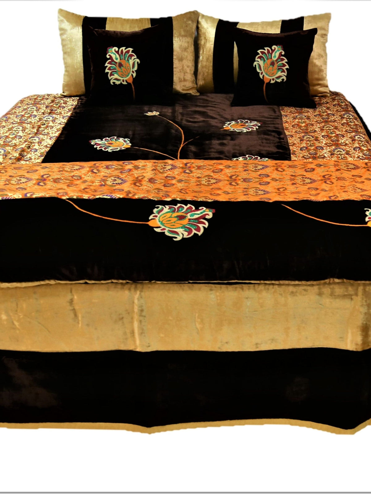 Black and gold flower embroidered velvet wedding set made up on a double bed