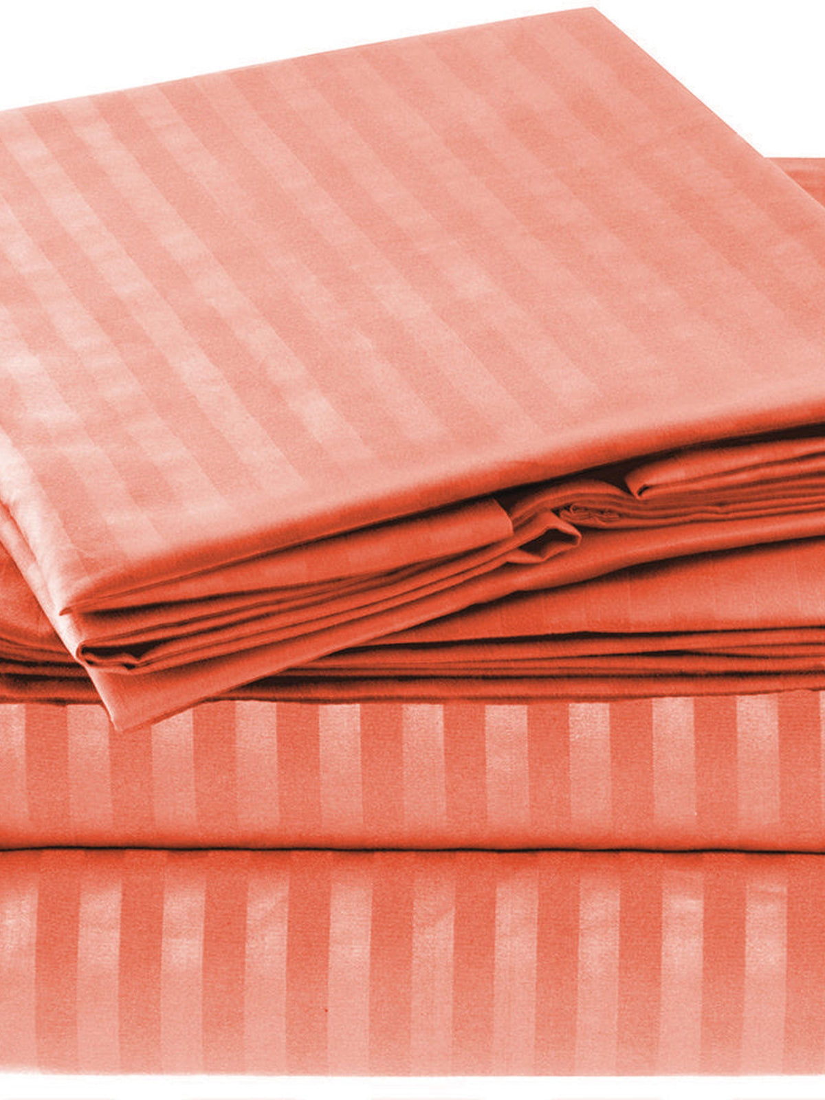 Terracotta cotton satin pillow covers with a self stripe, shown on a bed, 18x27 inch