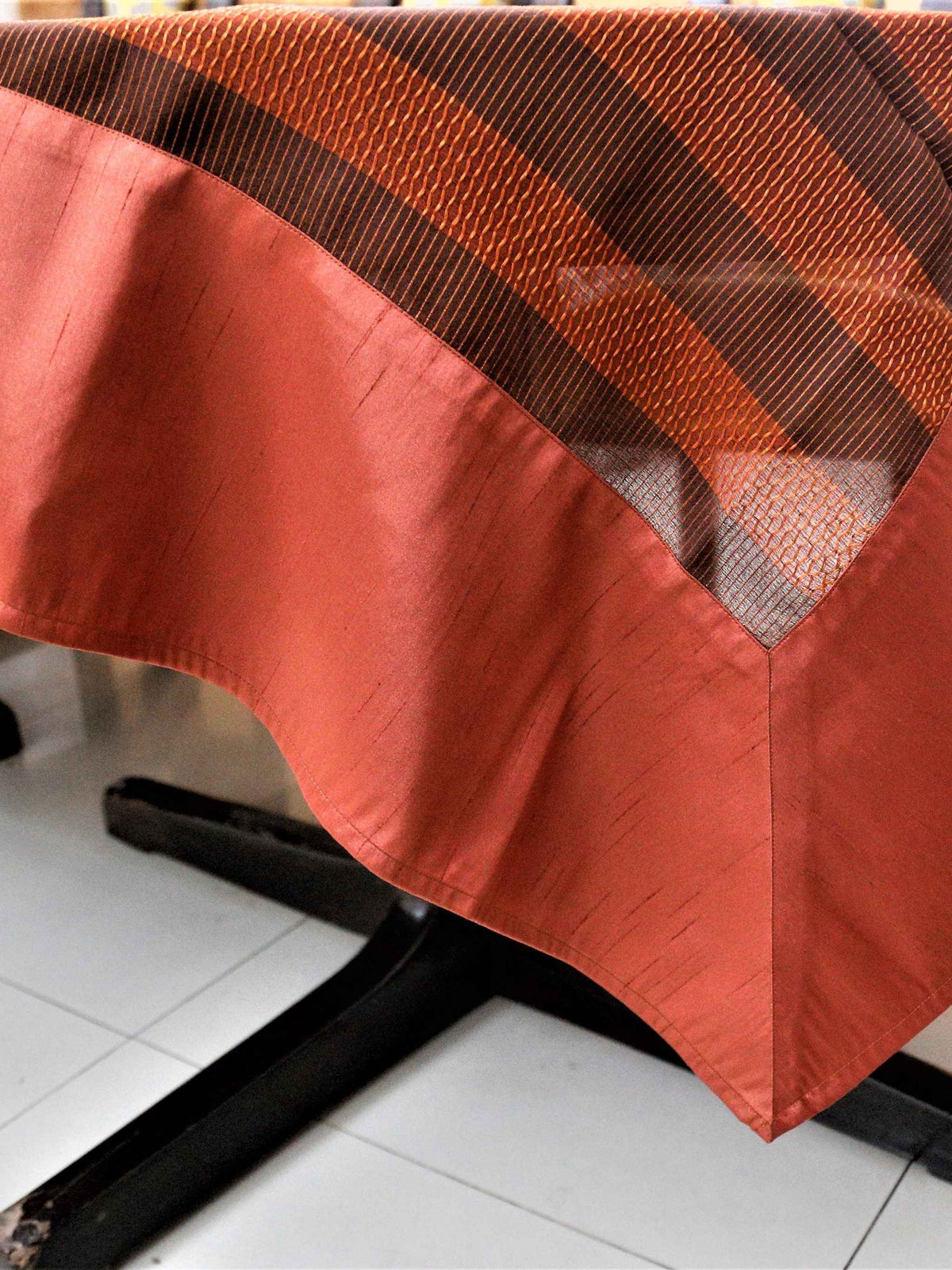 Rust-orange and dark brown horizontal striped sheer table cover