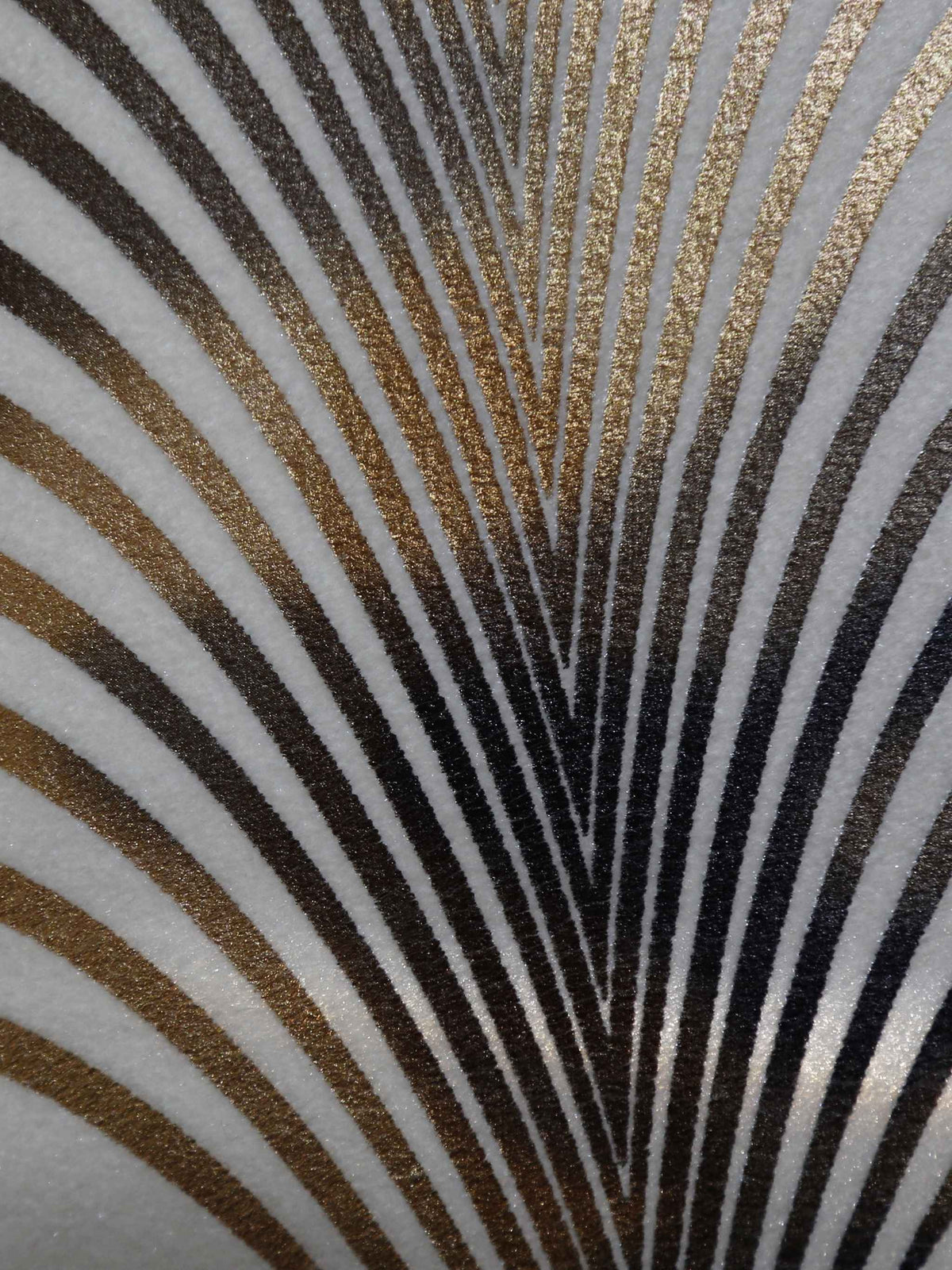 Close up of the black and gold foil printed fan arches on cream velvet