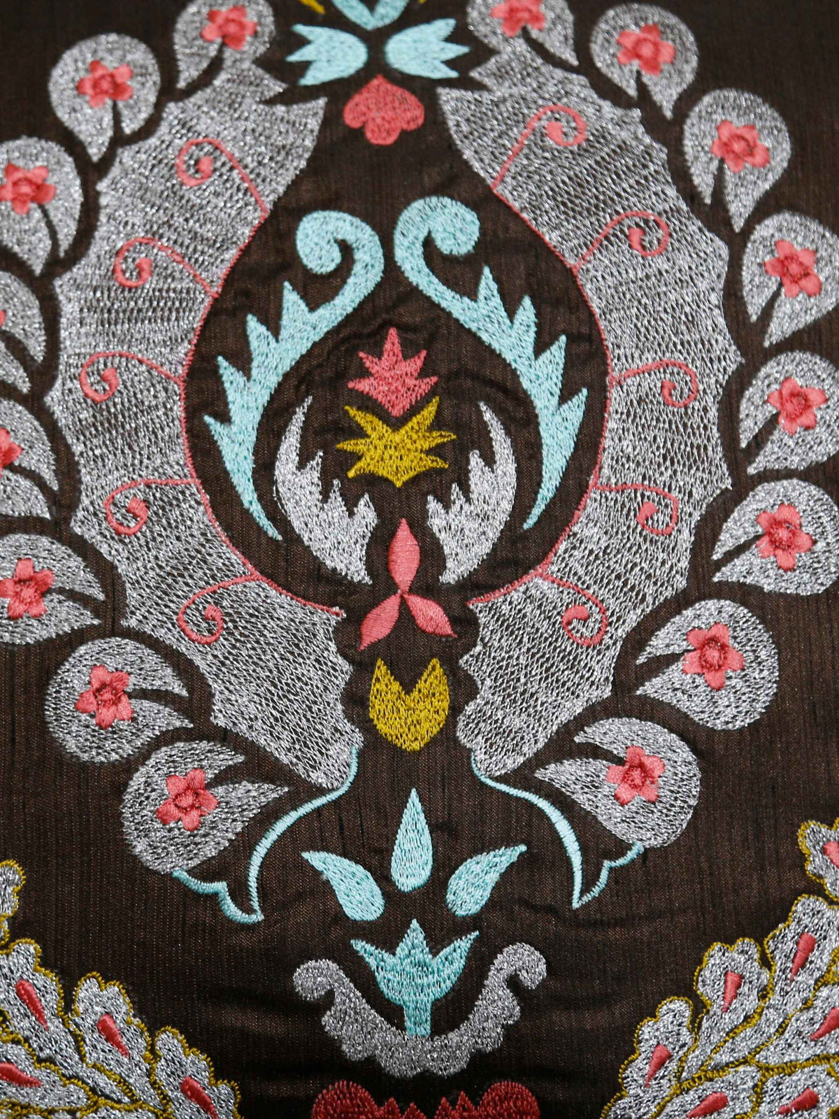 Close-up of the damask medallion embroidery
