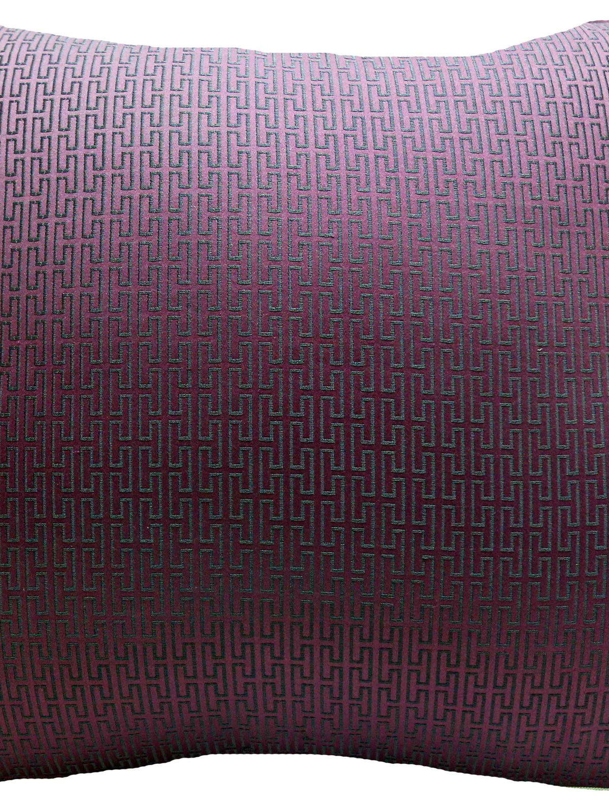 Plum Greek key jacquard back cushion filling the frame, showing the woven fret