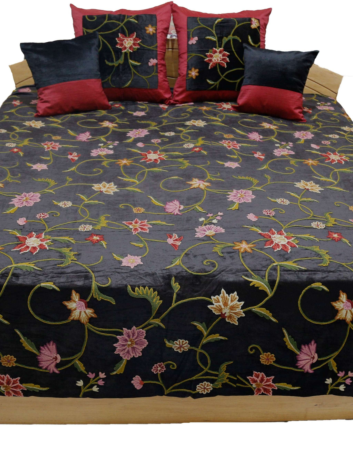 Black velvet double bedcover with a multicolour crewel floral embroidery, front view showing the 4 cushion covers