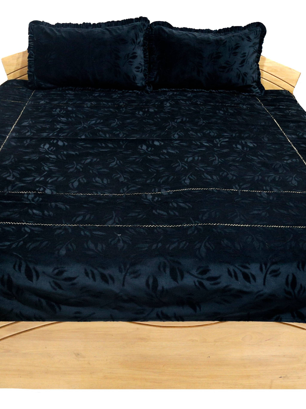 Black bedcover with an embossed woven leaf pattern, front view showing the 2 pillow covers