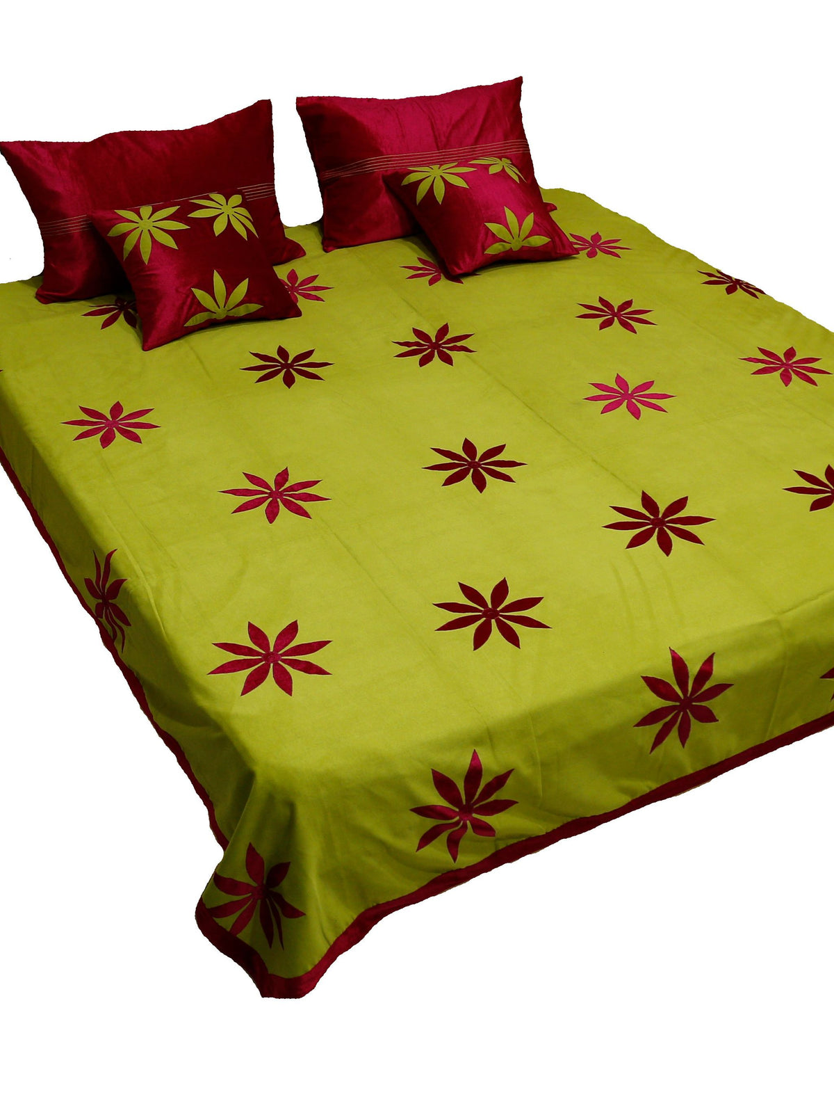 Lime green appliqué flower bedcover made up on a double bed, Sued