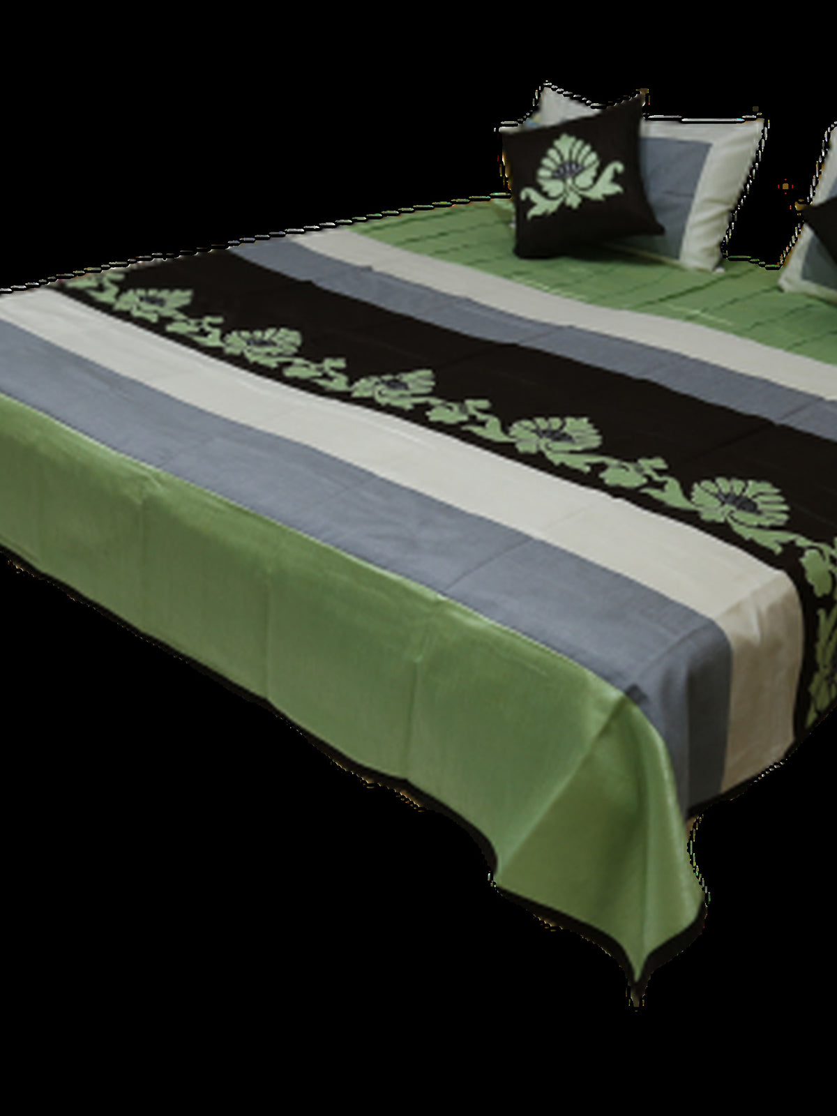 Green and black banded appliqué bedcover made up on a double bed, Bal Patch