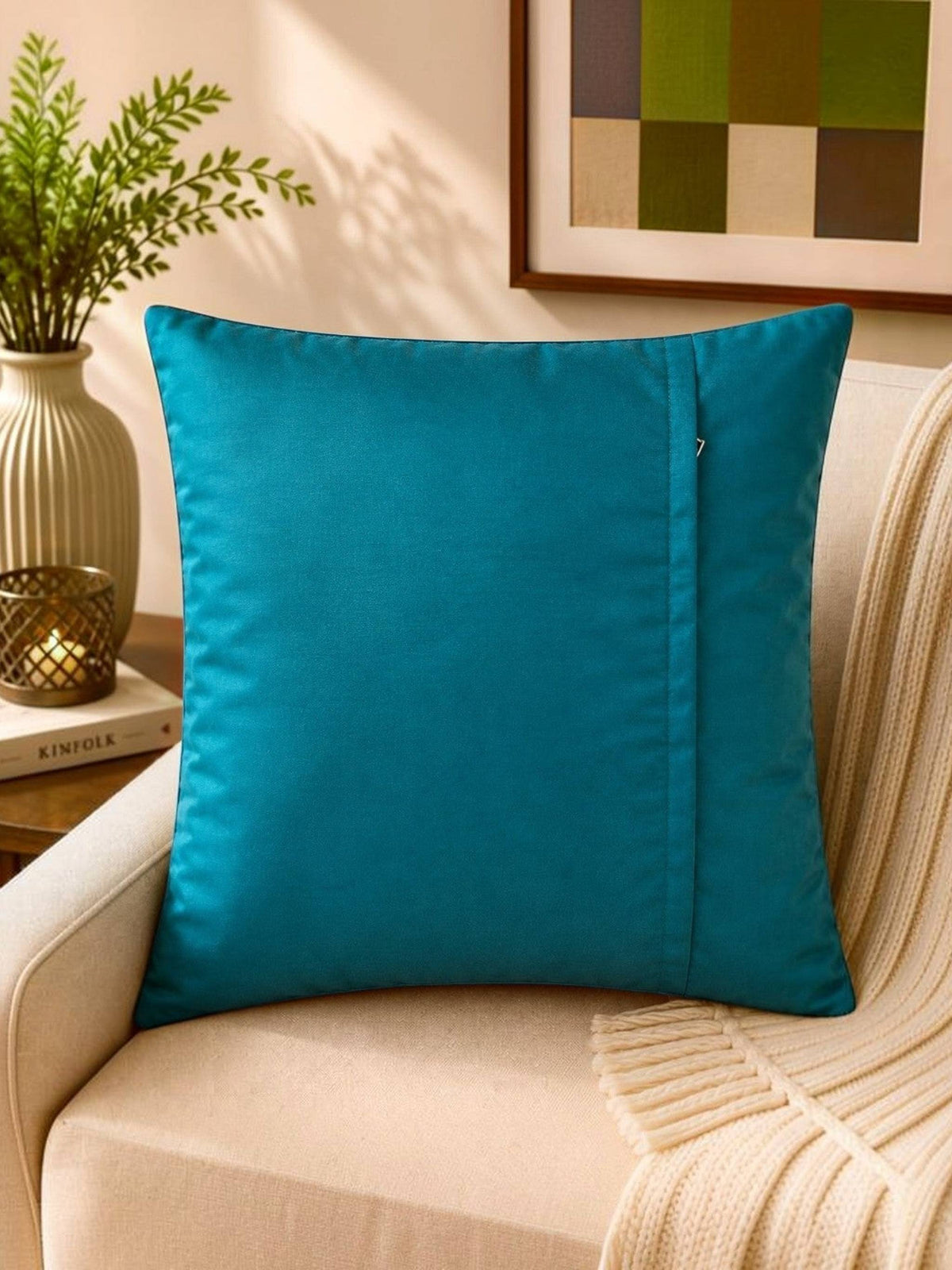 Blue polysilk cushion cover with red floral rose print on dark blue background
