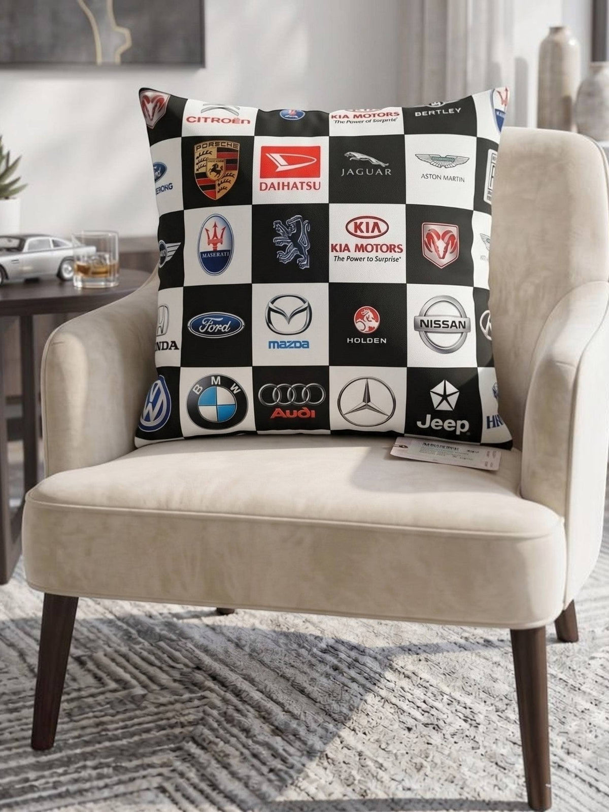 Reversible black and white polysilk cushion cover featuring automotive logo checkerboard print
