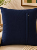 Navy blue velvet cushion cover with geometric dot pattern in beige and taupe tones