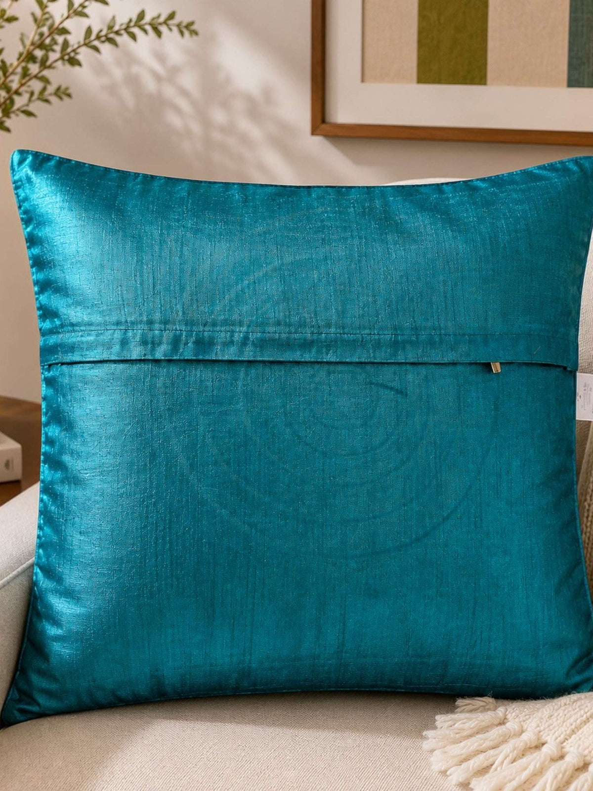Blue patch work polysilk cushion cover with circular applique design
