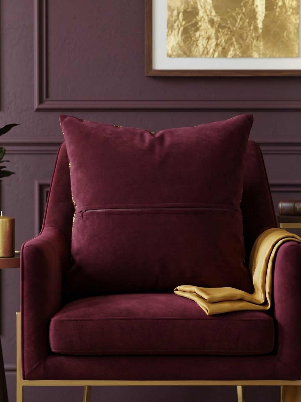 Jagdish Store burgundy cushion cover with abstract gold foil pattern for a luxurious modern home decor accent.