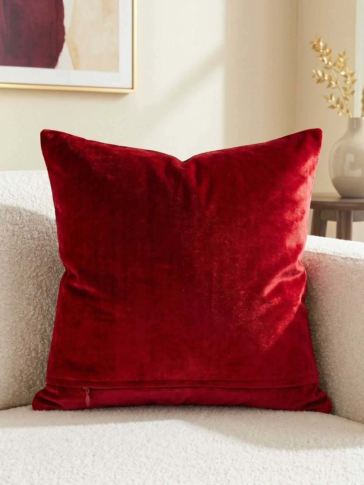 Jagdish Store red velvet cushion cover with an intricate gold glitter filigree motif for festive home decor.