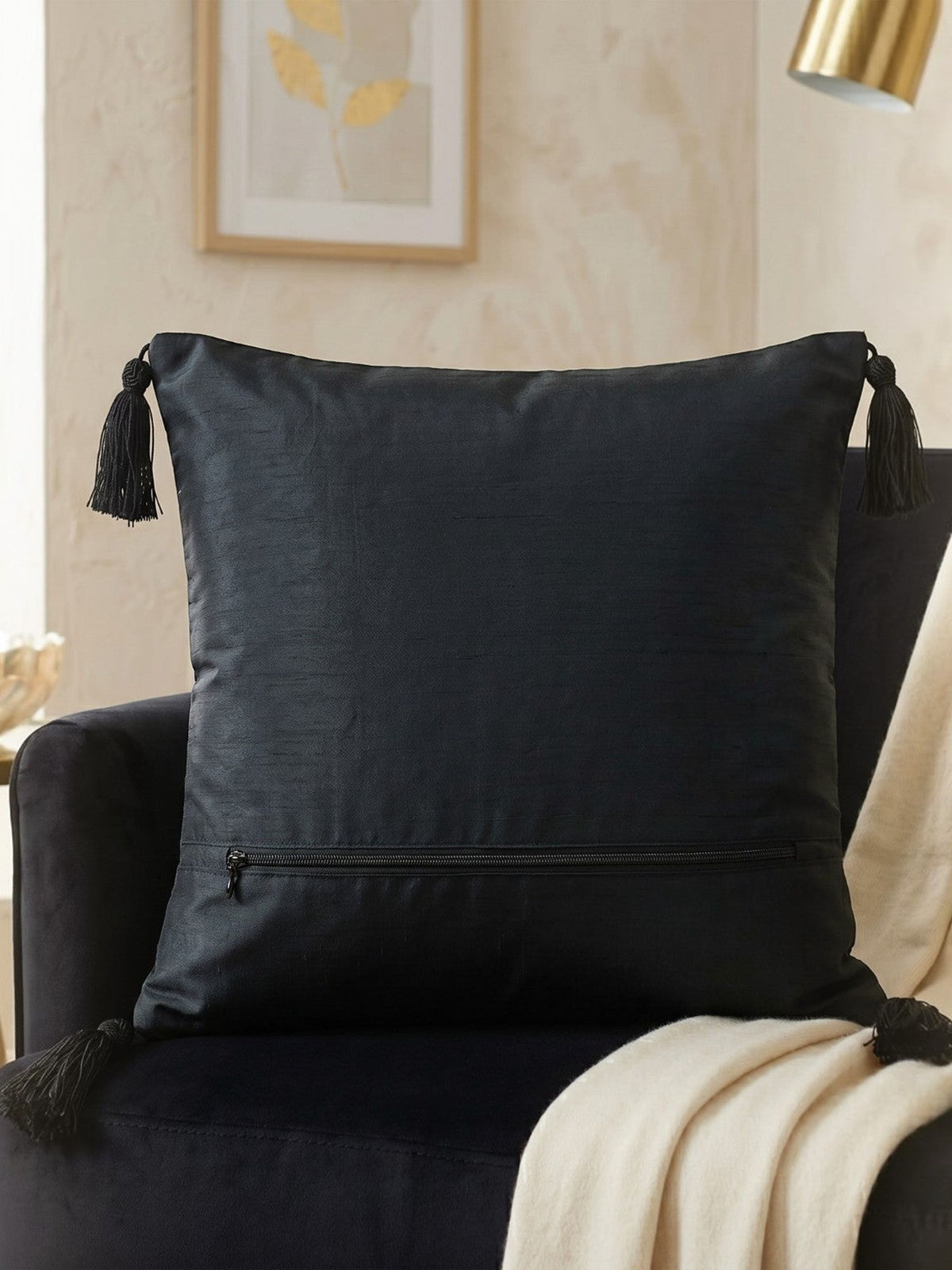 Jagdish Store midnight blue cushion cover with gold sequins, glass beads, white buttons, and black corner tassels.