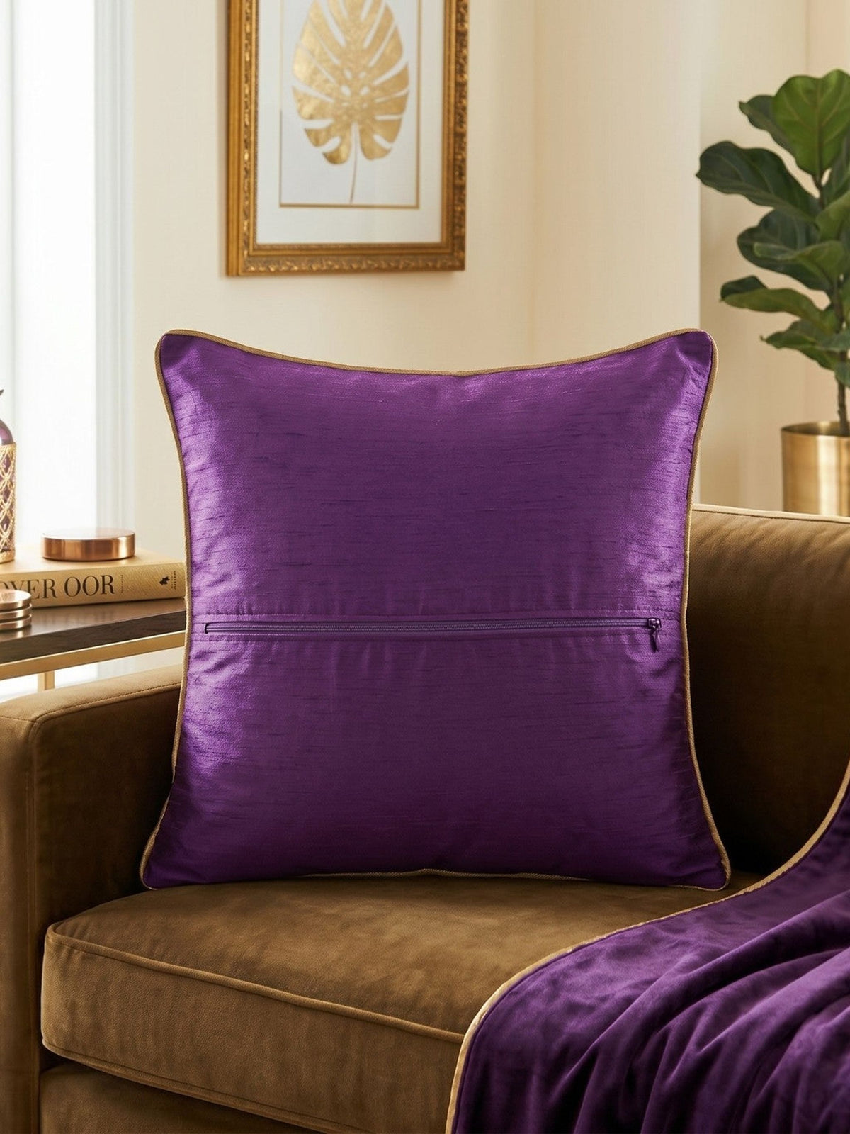 Jagdish Store purple cushion cover with intricate gold sequin floral embroidery and a luxurious textured finish.