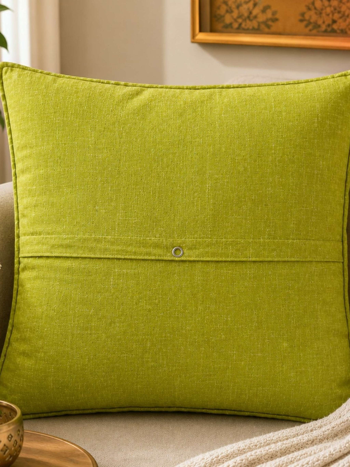 Green cotton cushion cover with floral embroidery and vine design