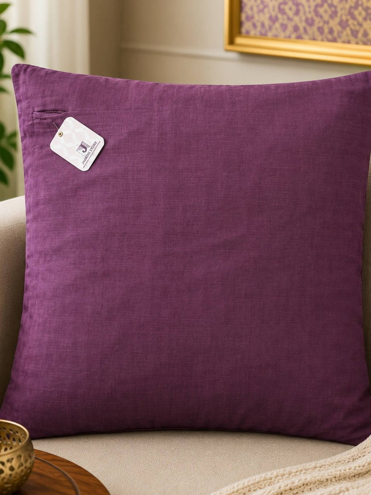 Purple cushion cover with ruched stripe textured design