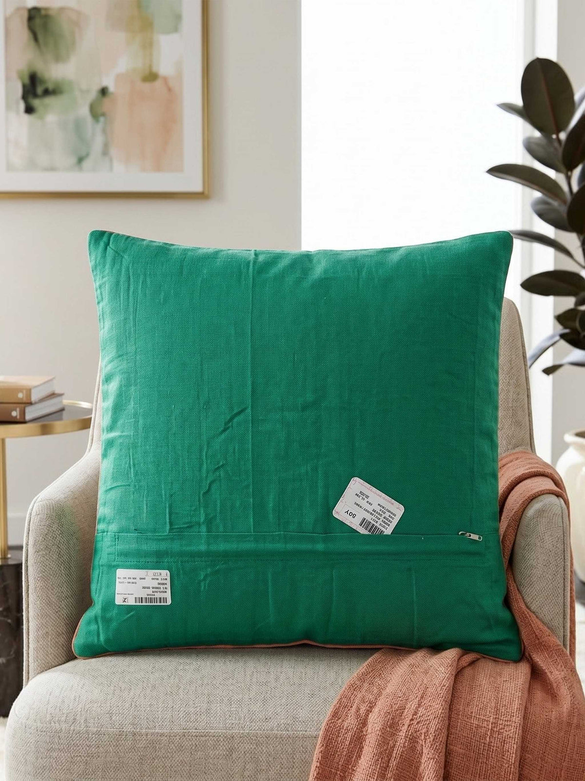 Jagdish Store pink quilted cushion cover with embroidered silver thread, colorful beads, and emerald green border.