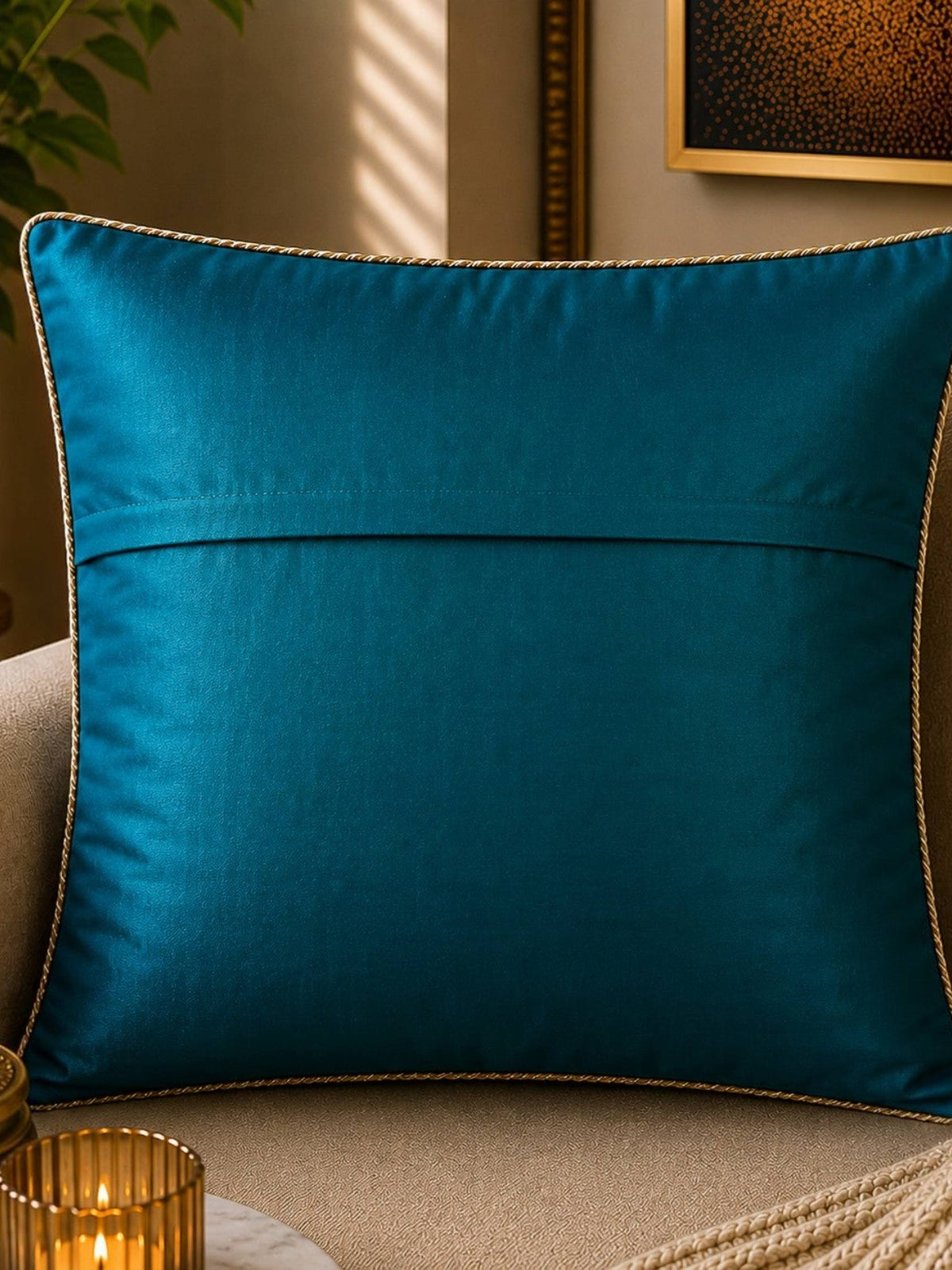 Jagdish Store teal decorative cushion cover with gold sequins and clear bead embellishments in a geometric pattern.