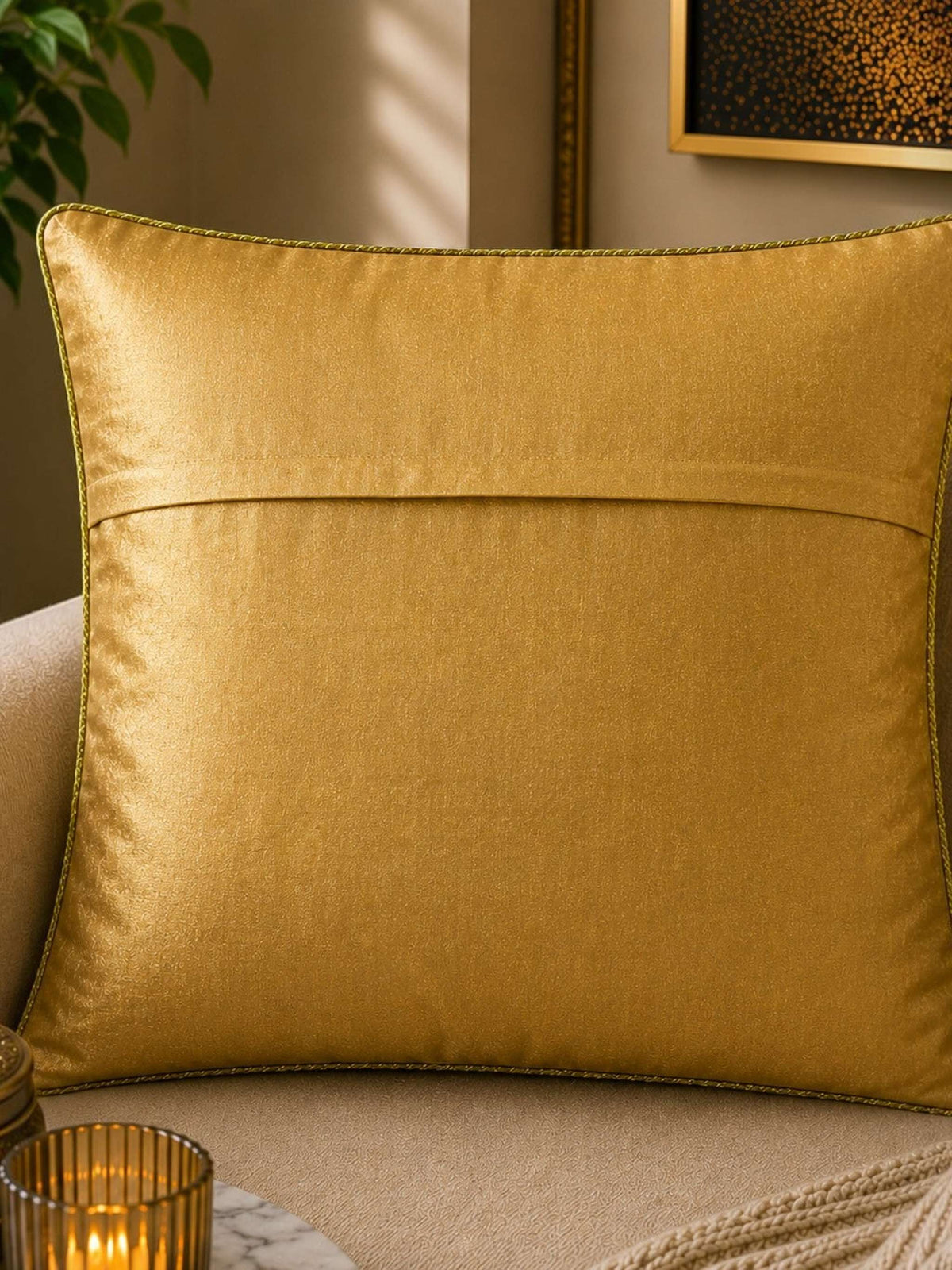 Jagdish Store decorative cushion cover with crimson red fabric, gold lotus embroidery, and gold trim. Features green accents.