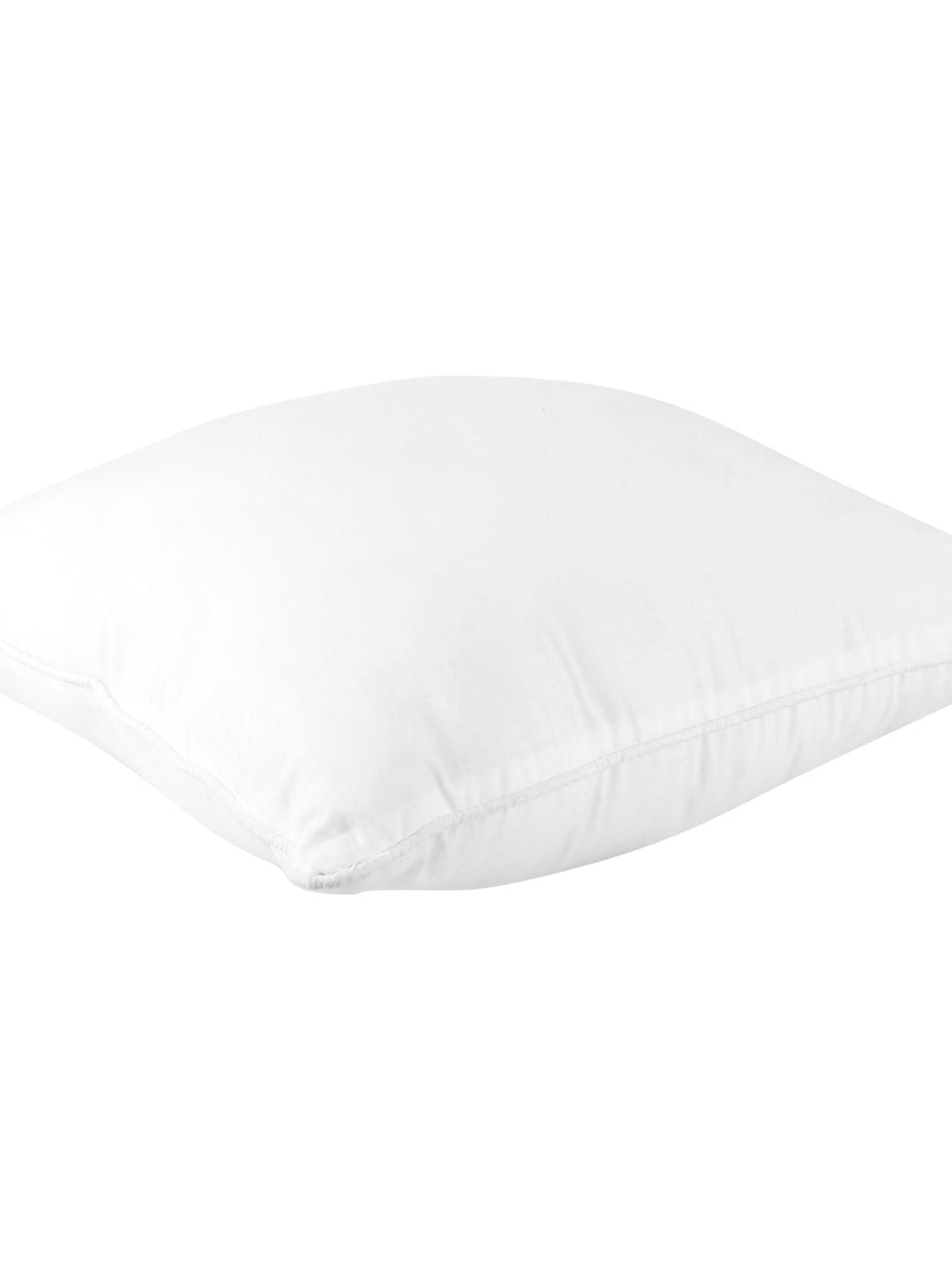 White polyfill cushion insert resting on its side, showing the loft of the filling