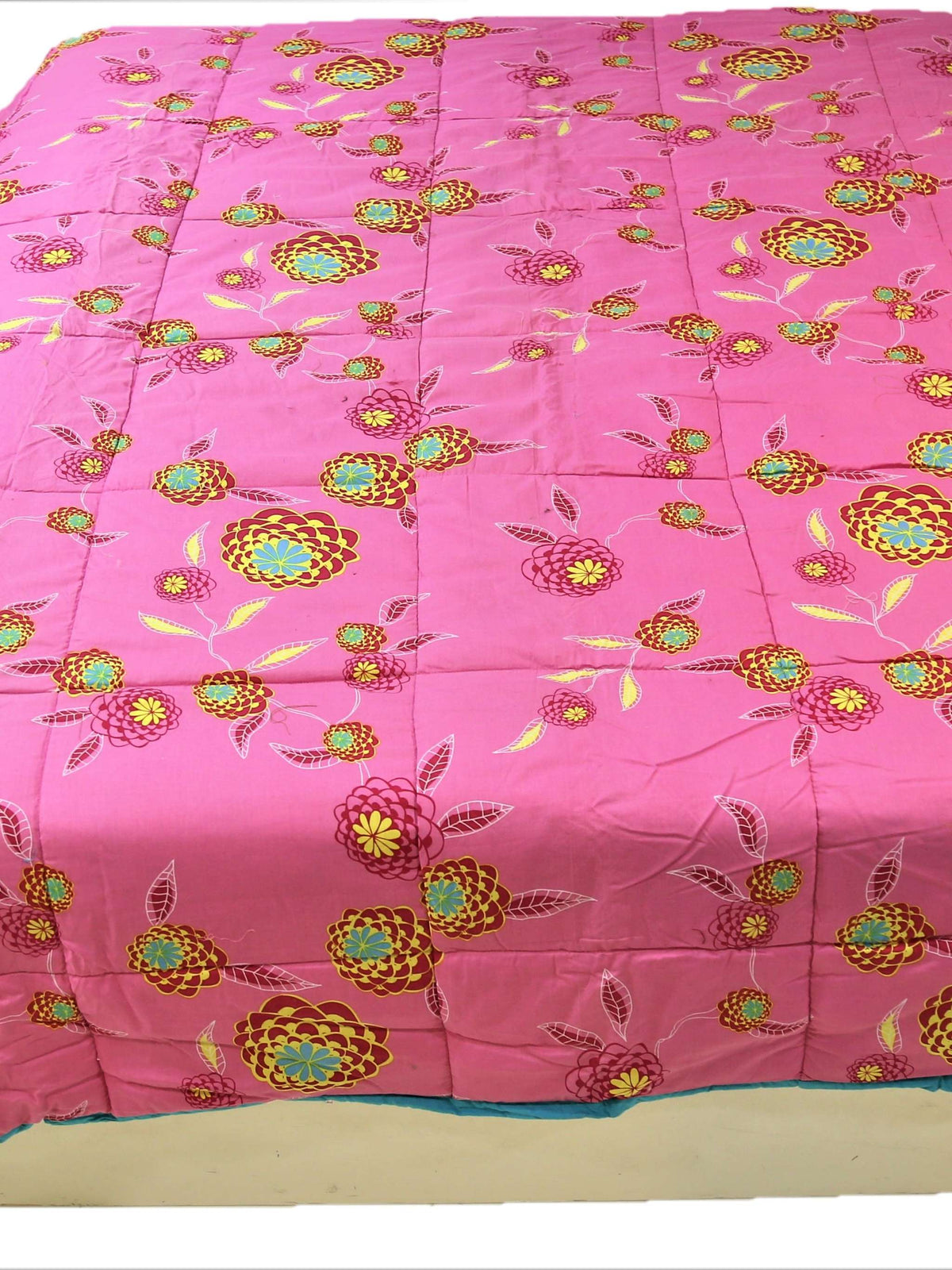 Pink floral print reversible cotton AC quilt for a double bed